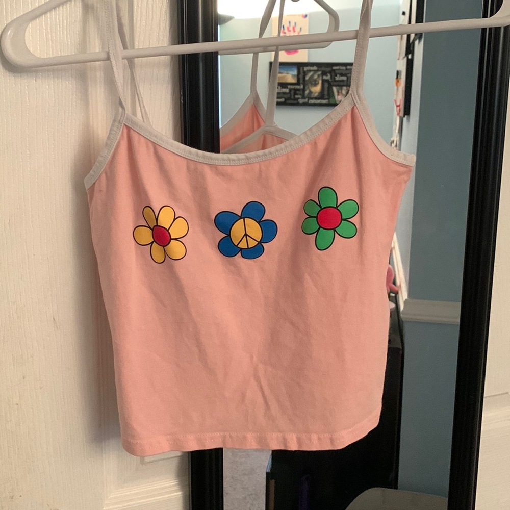 Pink and white crop top with different colored flowers size small